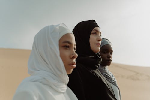 A Women Standing Together in the Desert