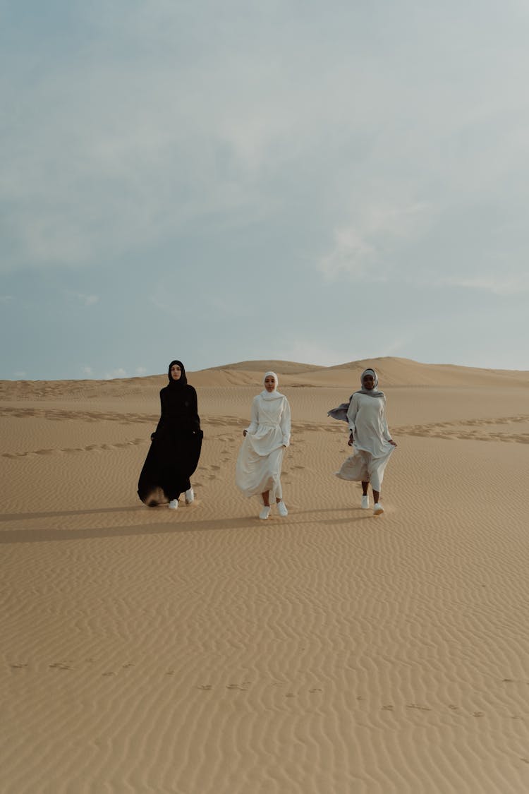 Women Running In The Desert