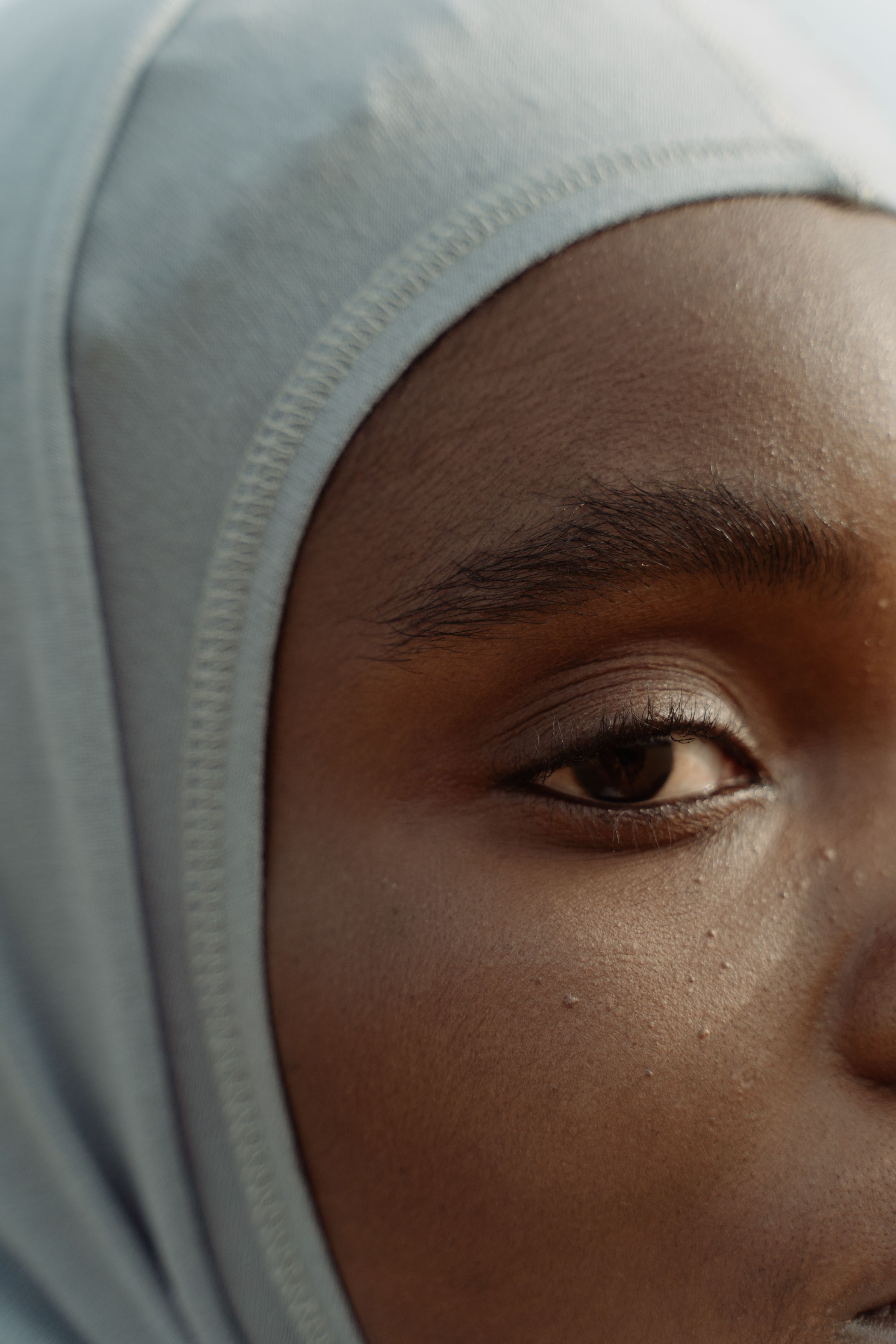 A Close-Up Shot of a Woman Wearing a Hijab · Free Stock Photo
