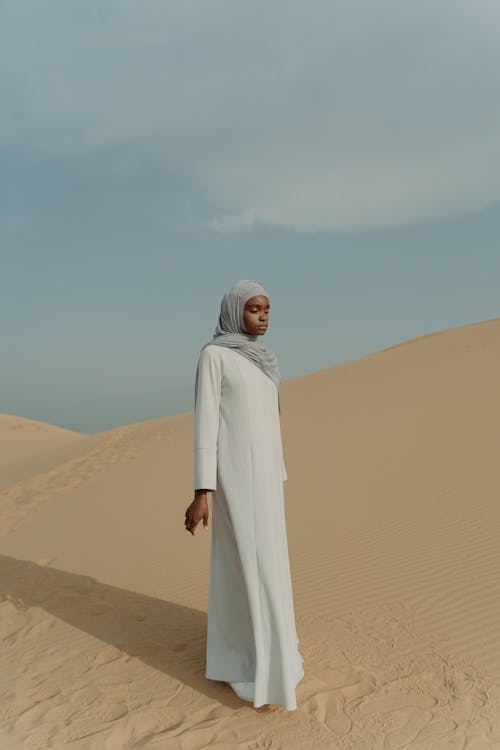A Woman Standing on the Desert