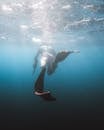 Person Fishing under Water 
