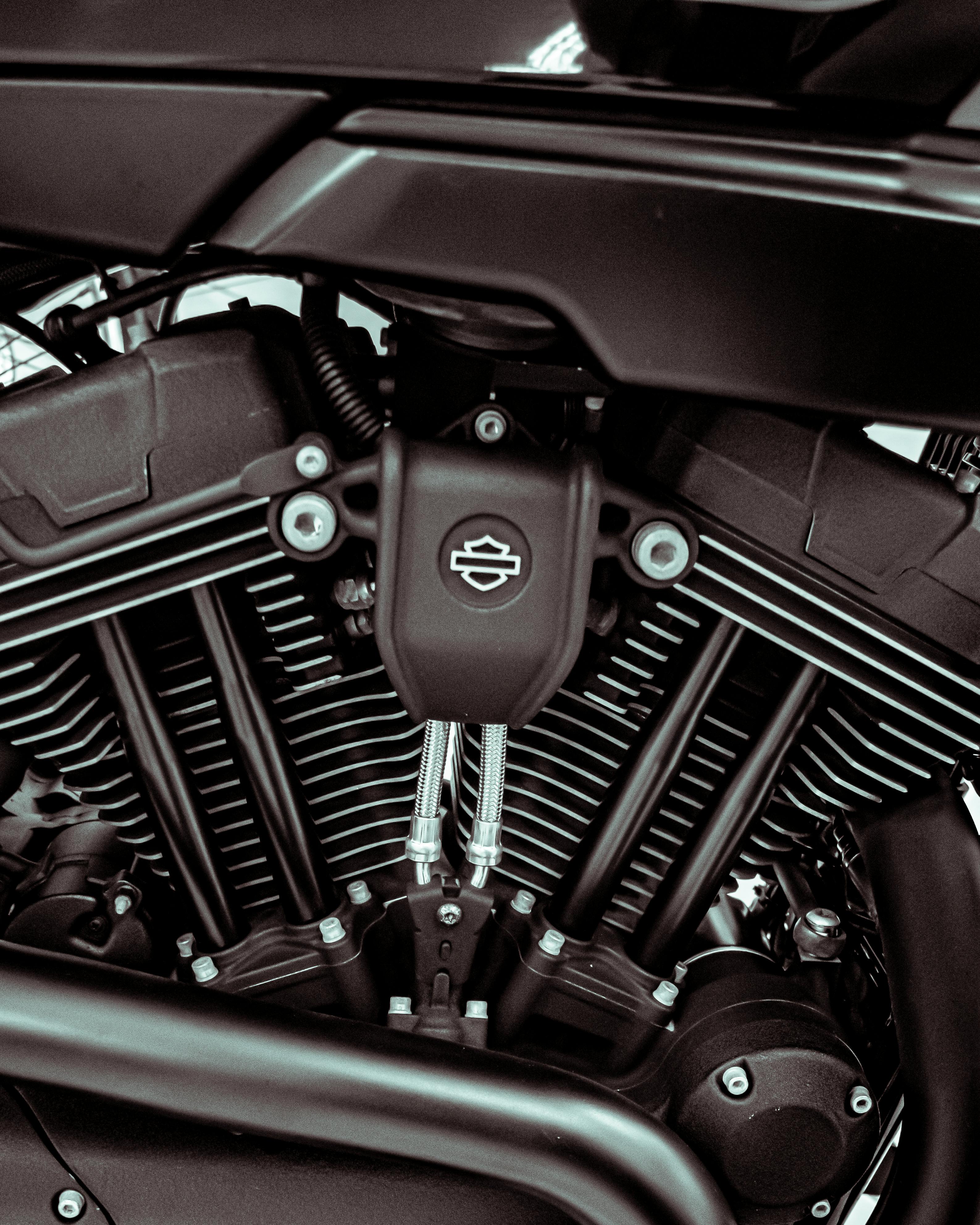 Detailed view of a Harley Davidson motorcycle engine showcasing intricate design.