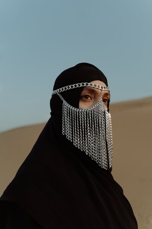 A Woman Wearing Jewelry Mask