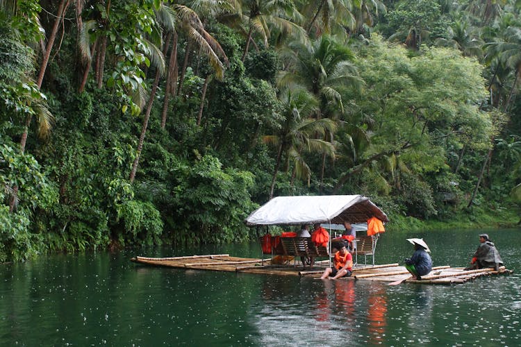 People On A Raft Exploring Padin Lake