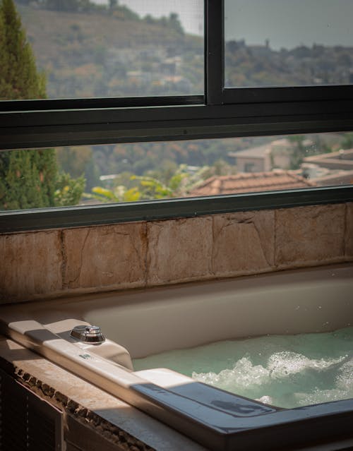 Bath and Window With View at Hills