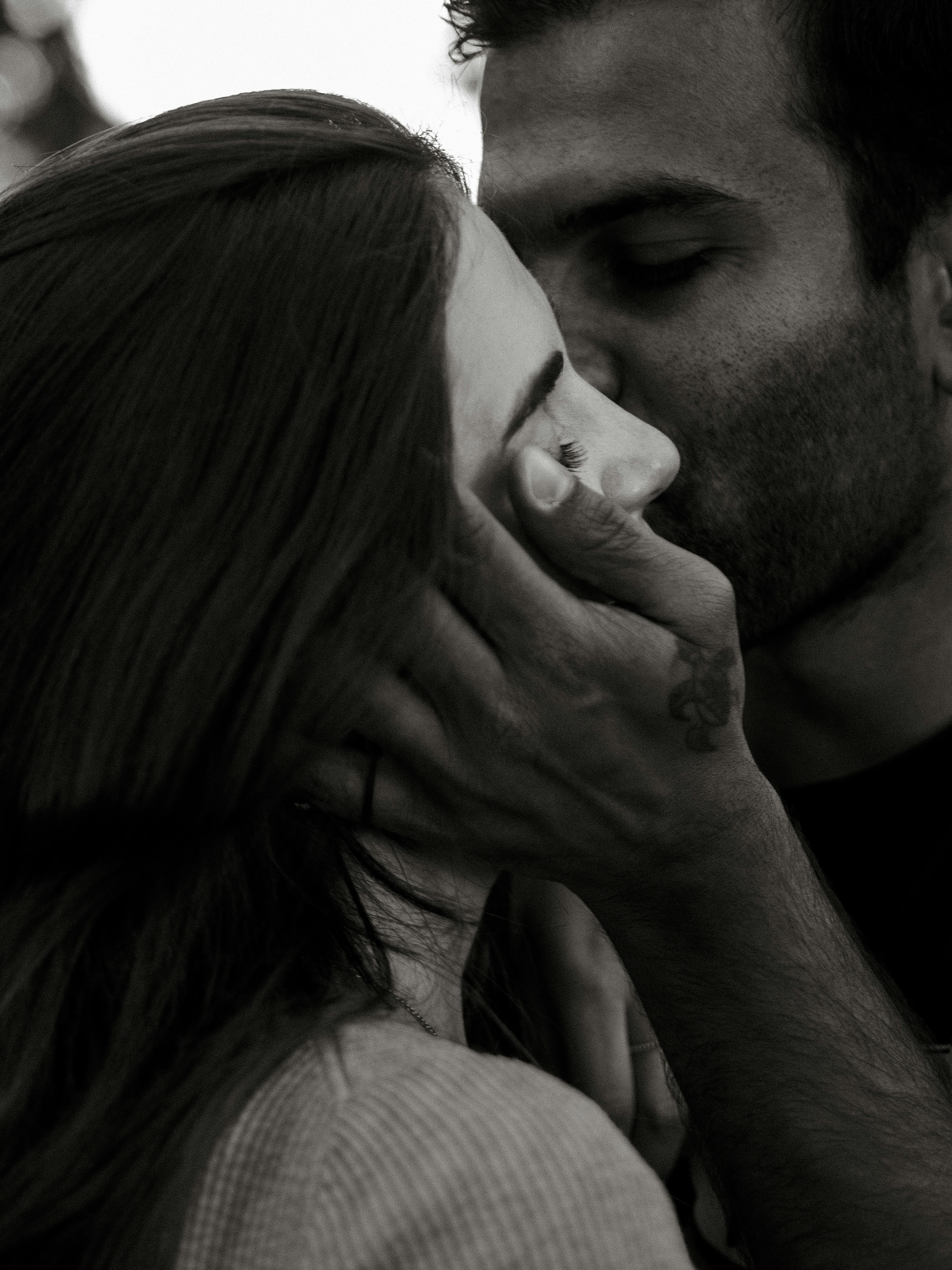Black and White Portrait of Couple Kissing · Free Stock Photo