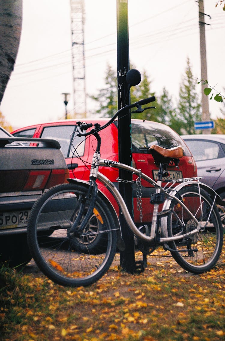 A Bike Locked On A Post