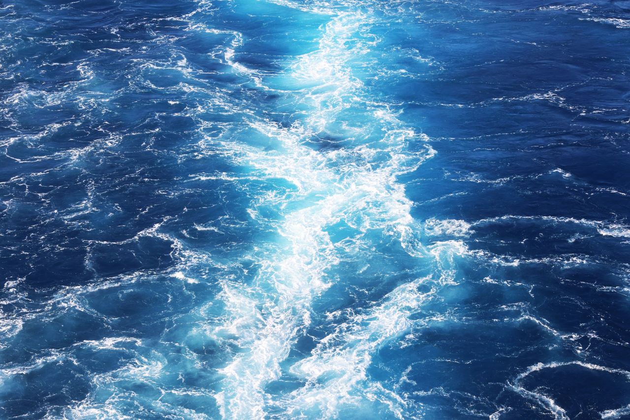 captivating view of ocean waves showcasing the vibrant deep blue sea a