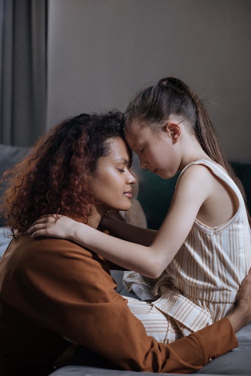 Mother Hugging Daughter - dating a woman with a child and ex