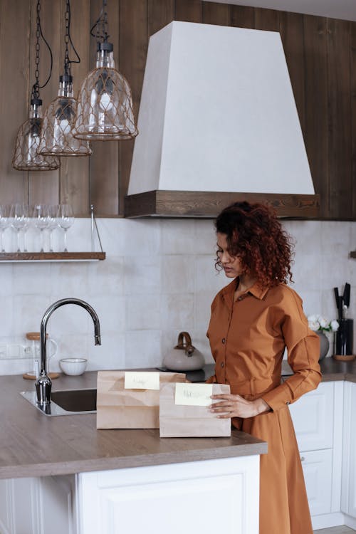 Woman Preparing Lunch Bags