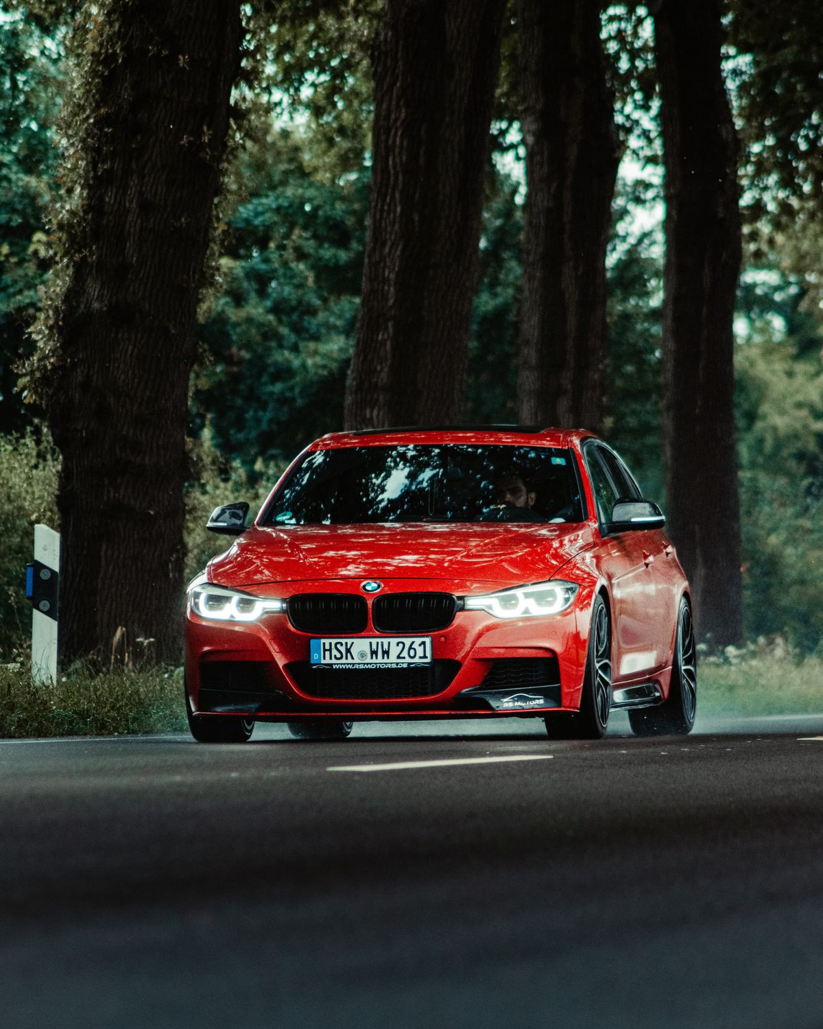 A Red BMW on the Road · Free Stock Photo