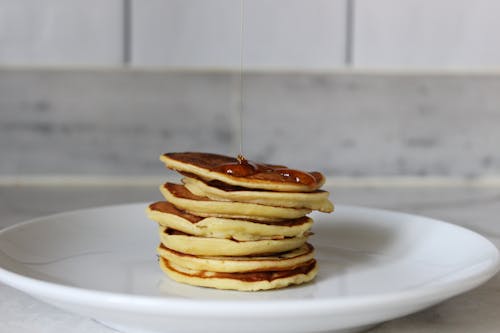 Free A Pancakes with Syrup on a Plate Stock Photo