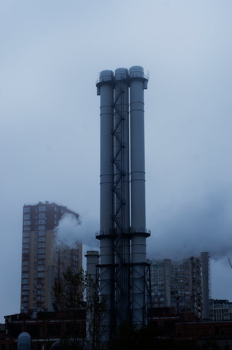 Tall Smoke Stacks Of Factory