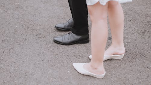 Free A Person Wearing Black Leather Shoes Stock Photo