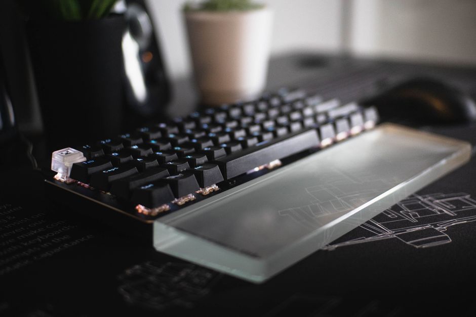 A high-quality gel wrist rest placed in front of a sleek mechanical keyboard - wrist extensor stretch A high-quality gel wrist rest placed in front of a sleek mechanical keyboard - wrist extensor stretch