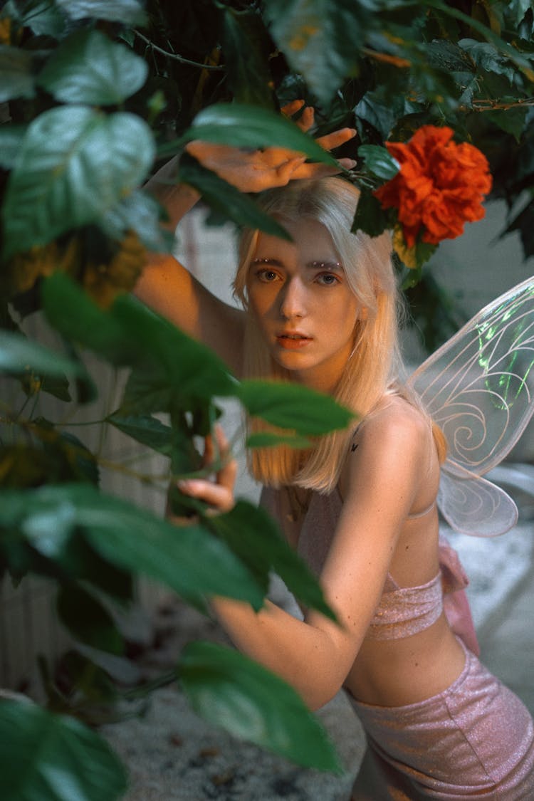  Woman Dressed As Fairy With Flowers