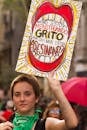 A Woman Holding a Placard