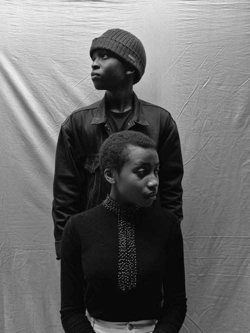Free Artistic black and white portrait of two individuals in Nairobi, Kenya. Stock Photo
