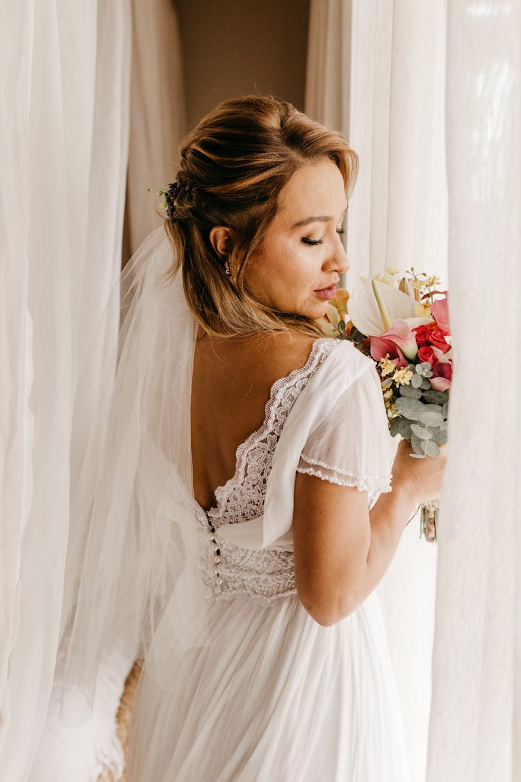 Rear View On Woman In Wedding Dress