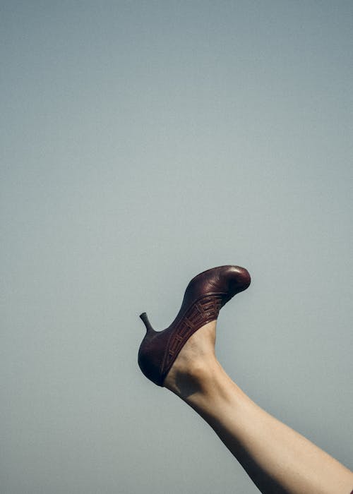 Free Person Wearing Brown Leather Heels Stock Photo