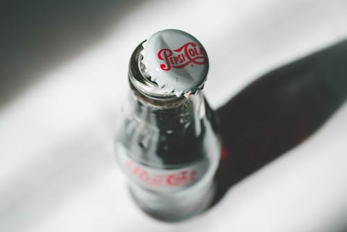 Opened Coca-cola Soda Bottle