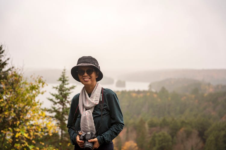 Elderly Woman Holding A Camera