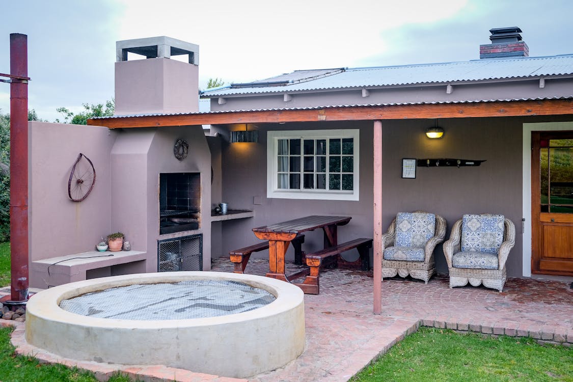 An unused, above ground pool in a house's patio