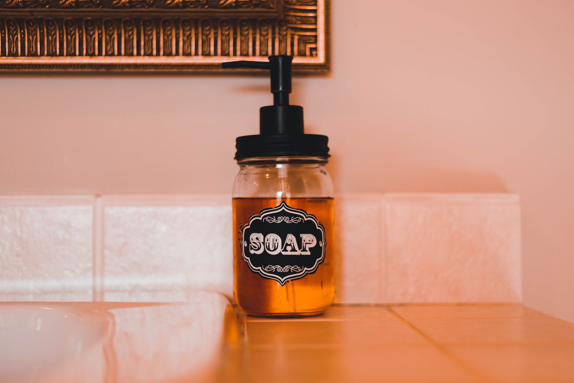 A Bottle With Dispenser With a Soap Inside