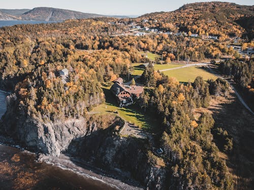 An Aerial Shot of a House Near a Cliff
