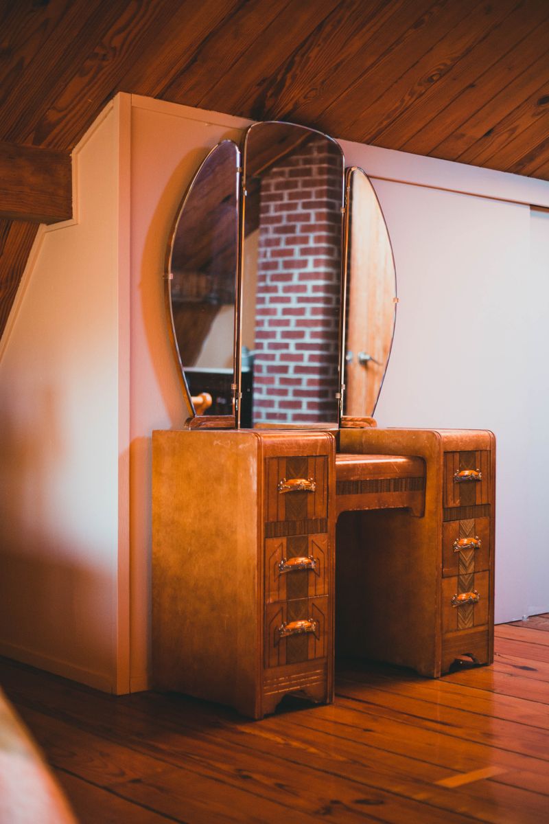 Elegant vintage wooden vanity table with mirror