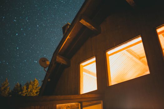 Brown Wooden House With Glass Window