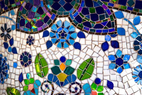 Free Vibrant close-up of a colorful floral mosaic art piece with intricate patterns. Stock Photo
