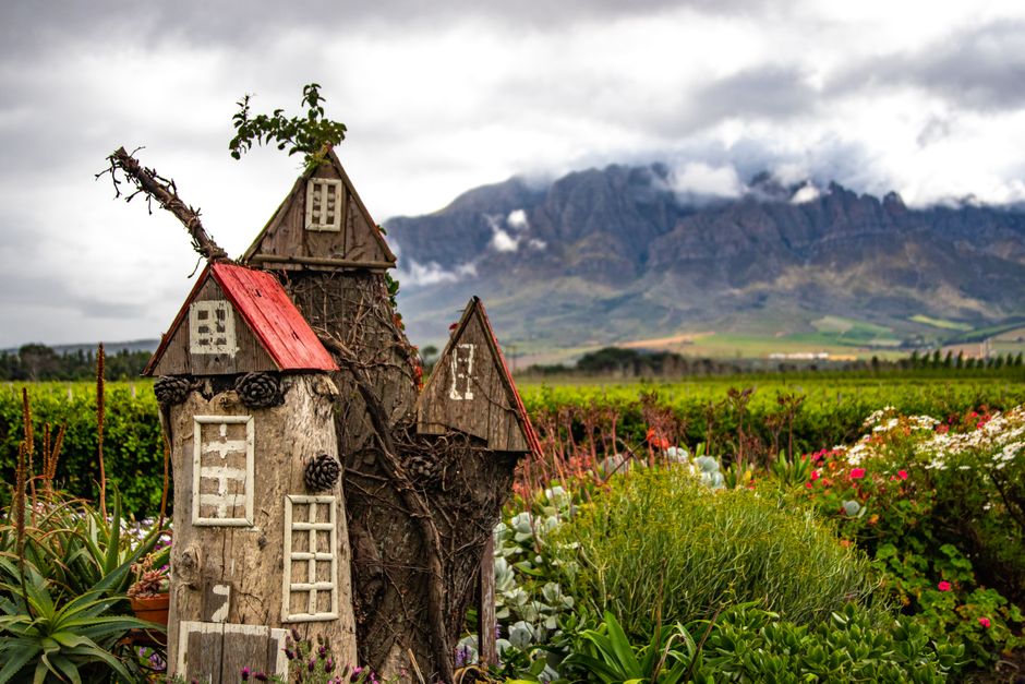 Cozy guesthouse exterior with garden in Stellenbosch wine region, South Africa