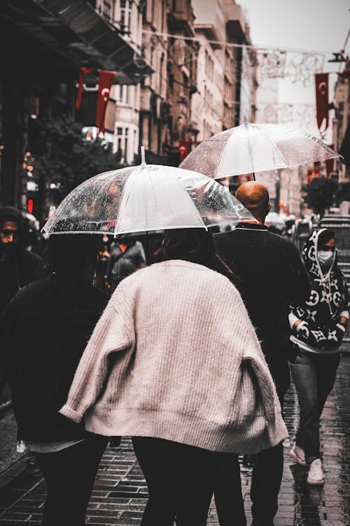 Free A People Using Umbrella Stock Photo