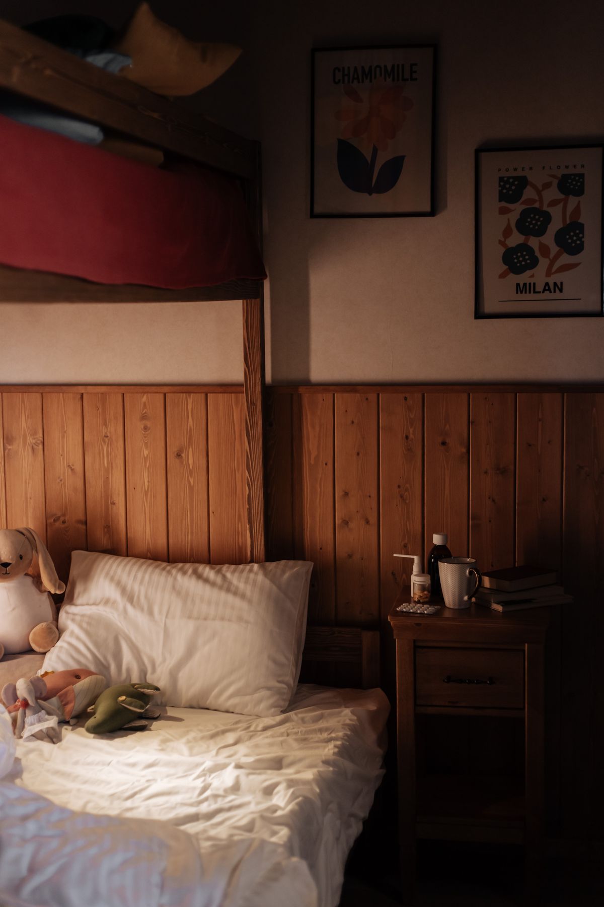 Cozy children's bedroom with soft bedding and warm decor