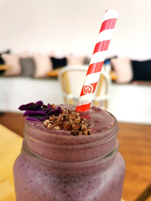 Free Close-Up Photo of a Purple Smoothie with a Straw Stock Photo