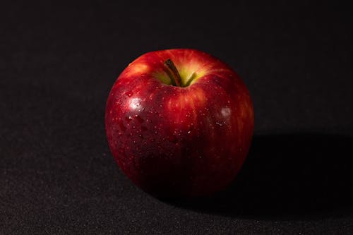 Red Applye in Close Up Photography