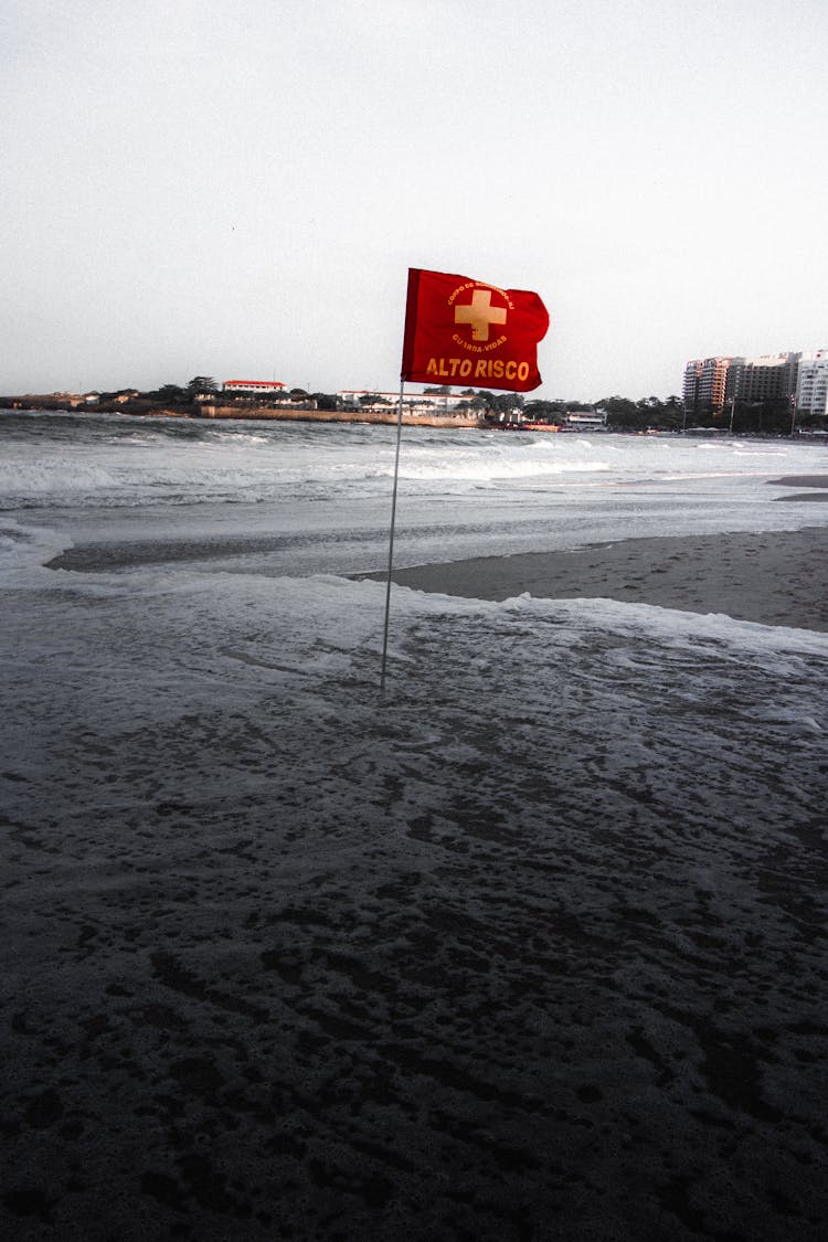 Warning Flag On Shore