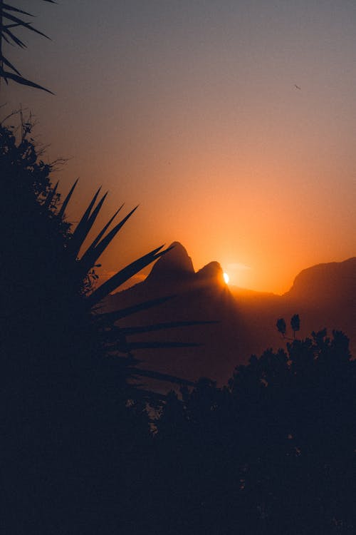 Free Silhouette of a Mountain during Sunset Stock Photo