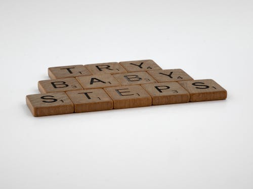 Free Brown Wooden Blocks on White Table Stock Photo