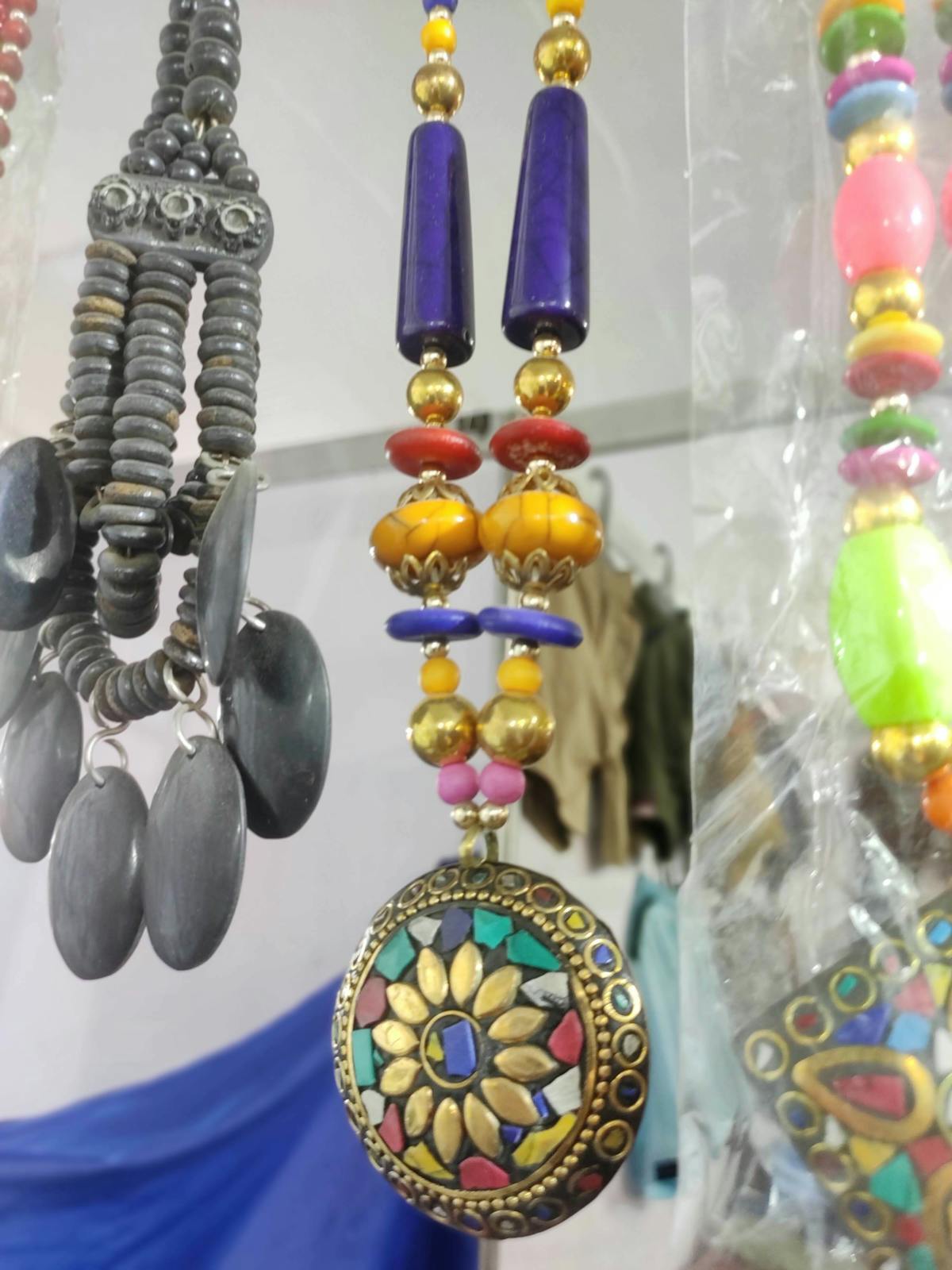 Person wearing layered streetwear outfit with cargo pants and oversized jacket