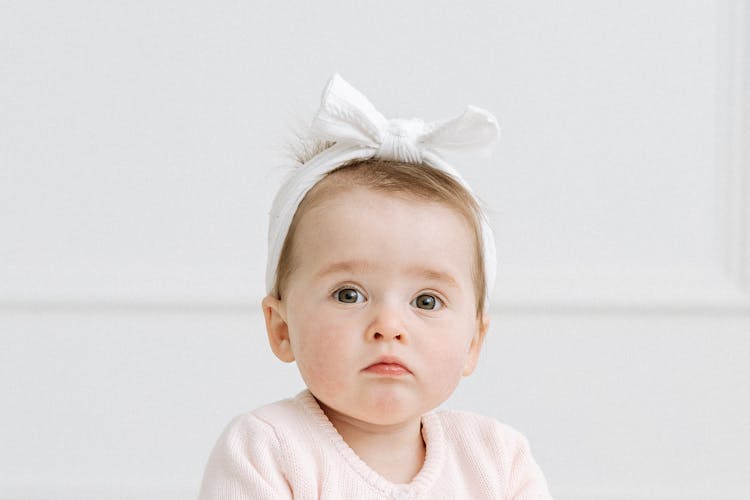 New Born Child With A Cute Headband