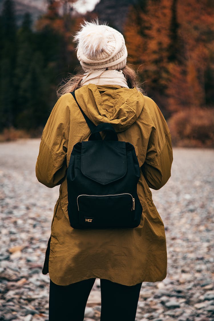 Rear View Of Woman In Jacket