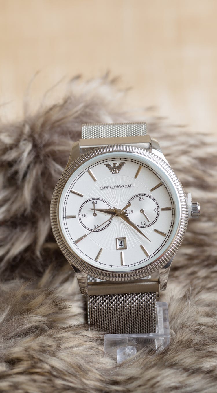 A Luxury Male Wristwatch Over Furry Background 