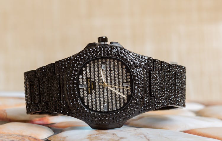 A Black Ladies Luxury Watch With Diamonds