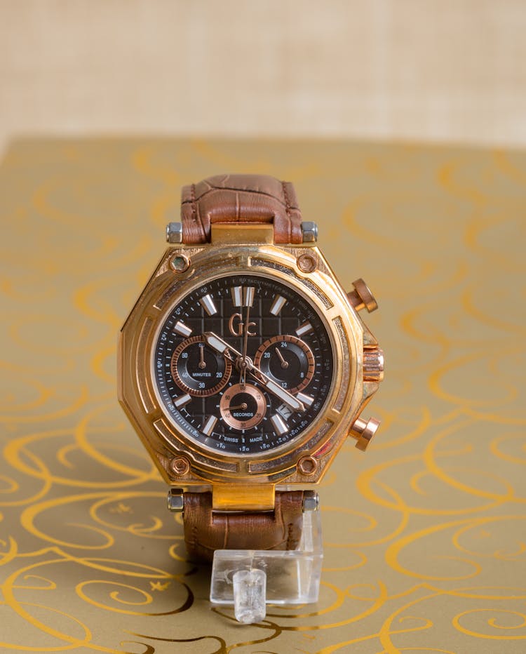 A Guess Gold Chronograph Men's Watch With Black Dial