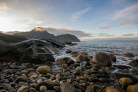 Brown and Black Rocks on Seashore