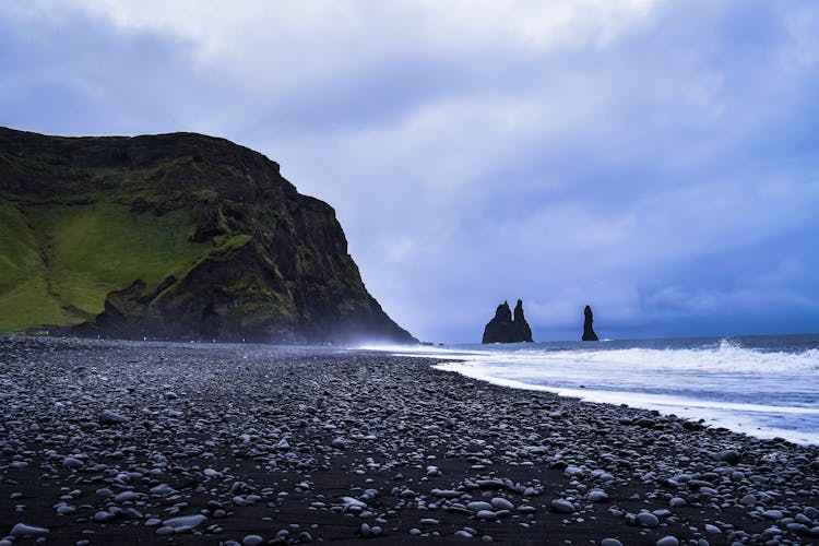 Landscape With Black Beach And Cliffs