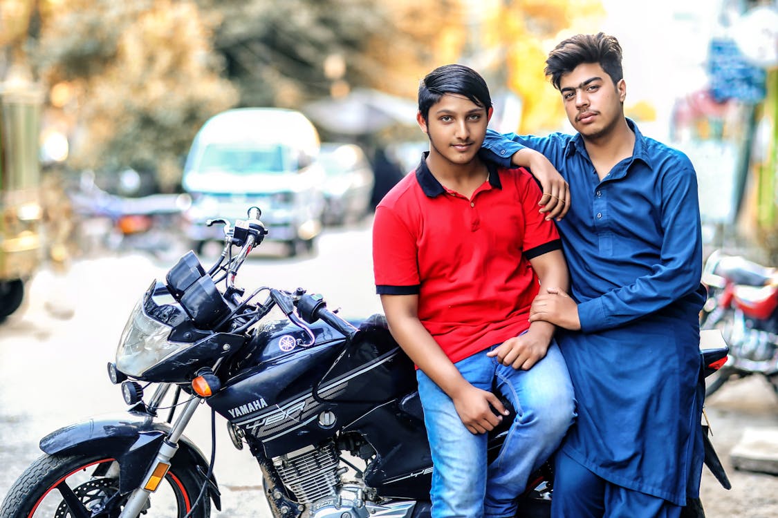 Two Men and Red and Blue Shirts