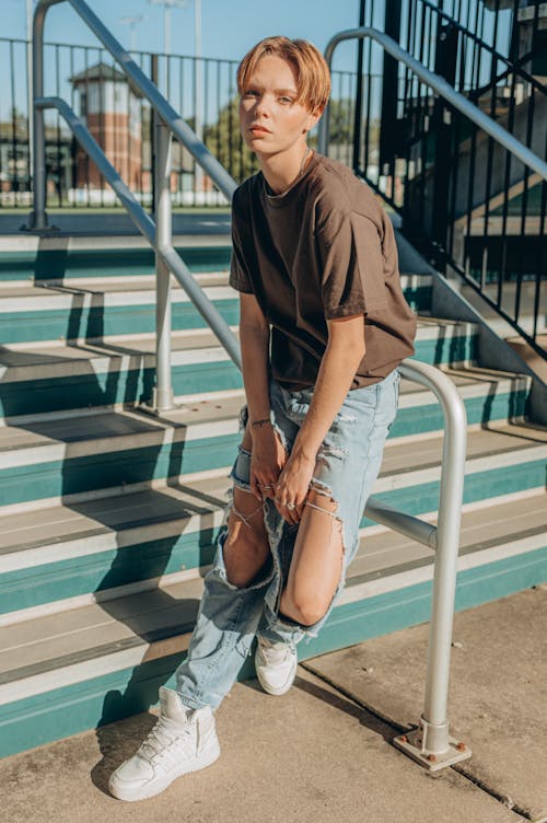 Woman Leaning on a Handrail